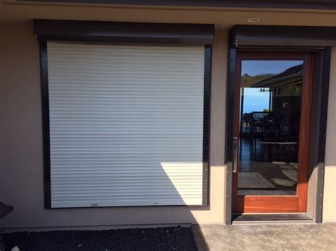 fabric hurricane shutters vs metal|roll down fabric hurricane shutters.